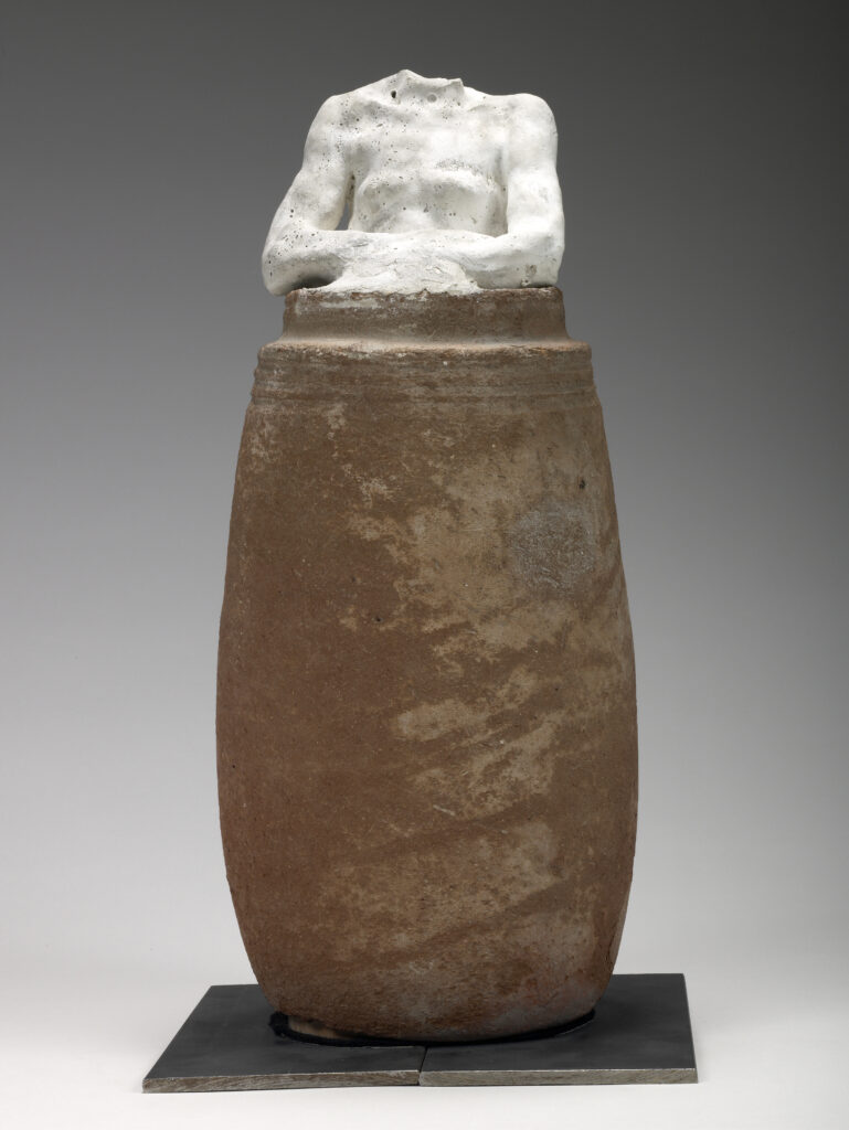 Assemblage, Nu féminin bras croisés, sans tête, dans une jarre, 1895