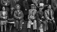 GREAT BRITAIN. London. Coronation of King George VI. 12 May 1937.

"People had waited all night in Trafalgar Square in order not to miss any part of the coronation ceremony of George VI. Some slept on benches and others on newspapers. The next morning, one who was wearier than the others, had not yet wakened to see the ceremony for which he had kept such a late vigil."
